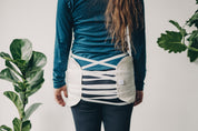 Hip Pads for Castor Oil with plants in white background