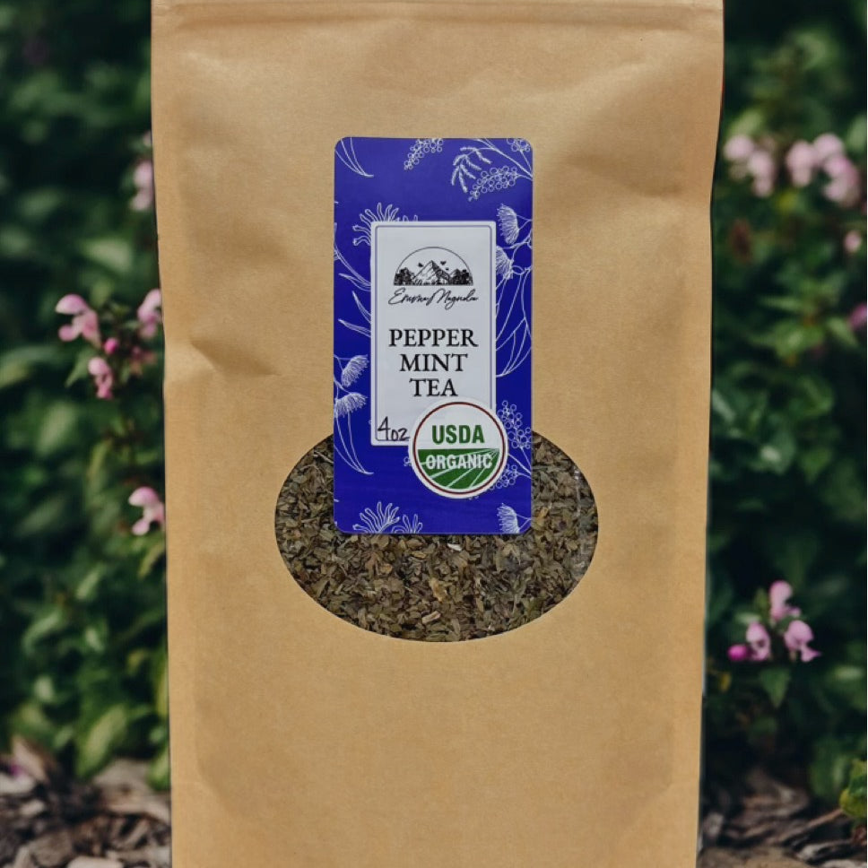Brown paper bag with a label for pepper mint tea against a natural background