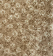 Textured fabric with a subtle pattern of geometric shapes in brown and beige.