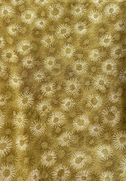Patterned fabric with floral design in beige and brown tones