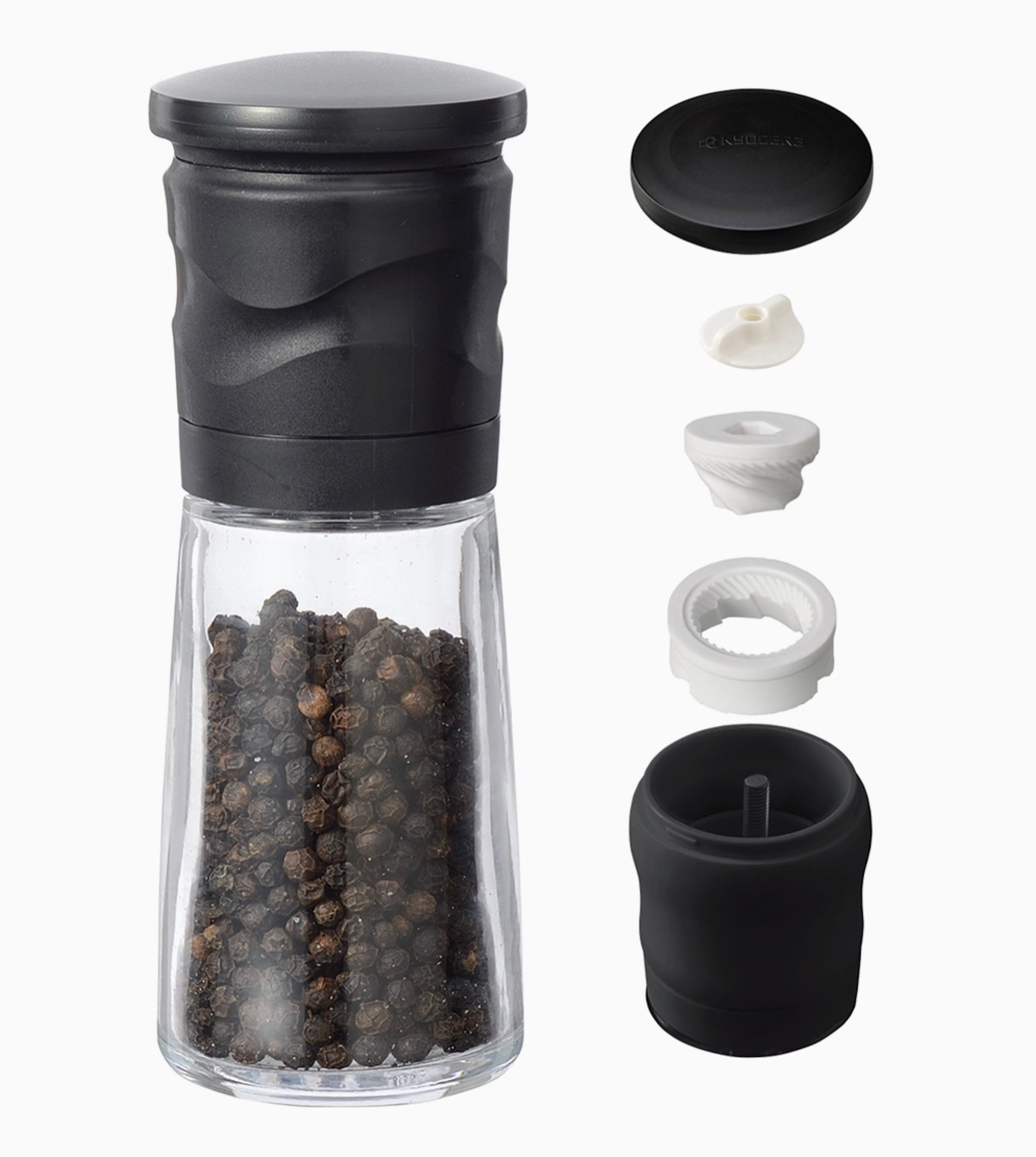 Black pepper grinder with detachable parts on a white background